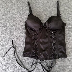 Corset style black top by Ole ole. Gently used. Size small.
